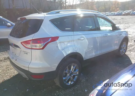 2014 Ford Escape Titanium z USA, uszkodzony, nr VIN 1FMCU9JX3EUB94620